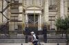 A cyclist rides past the Central Bank of Argentina in Buenos Aires, Argentina, on June 19.