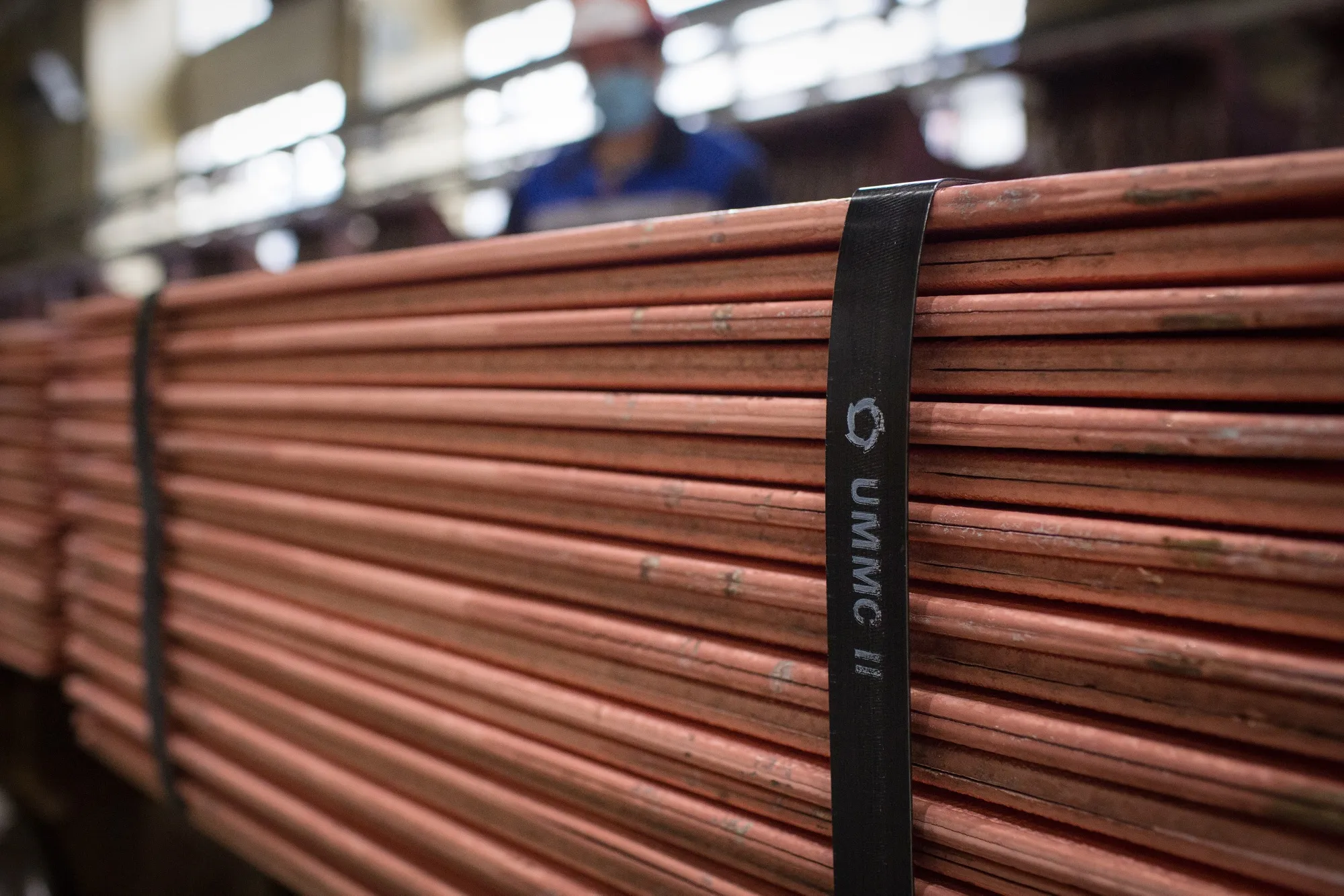 Branded binding secures newly-made copper cathode sheets in the electrolysis shop at the Uralelectromed Copper Refinery, operated by Ural Mining and Metallurgical Co. (UMMC), in Verkhnyaya Pyshma, Russia.