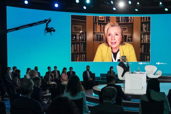 Clinton Warns on China, Russia; Finance’s ‘Big Bang’: NEF Update