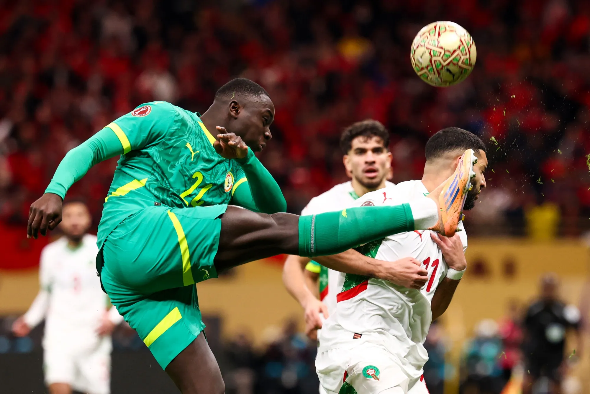 Morocco's midfielder Ismael Saibari fights for the ball with Senegal's forward Habib Diallo during the Africa Cup of Nations final football match&nbsp;in Rabat on Jan. 18.
