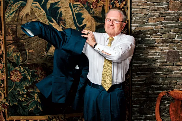 Thomas Peterffy in front of an 18th century earth goddess tapestry in his home office in Greenwich, Conn.