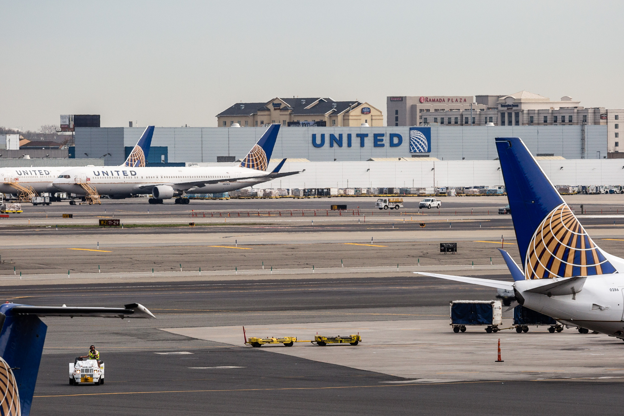 United Continental Holdings Inc. airplanes sit outside the company's hangar at Newark Liberty International Airport (EWR) in Newark, New Jersey, U.S., on Wednesday, April  12, 2017.