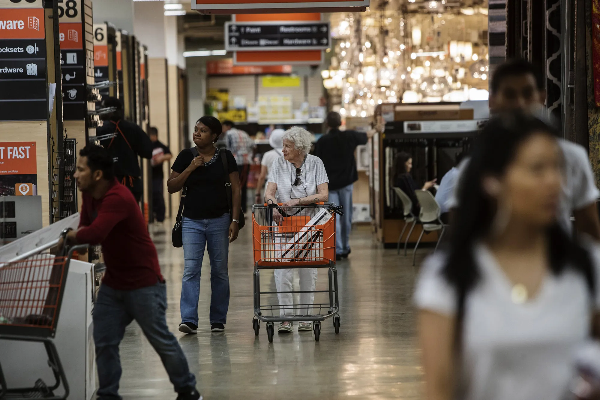 Customers shop at a Home Depot Inc. store in New York, U.S., on Friday, Aug. 11, 2017. Home Depot Inc. is scheduled to release earnings figures on August 15.
