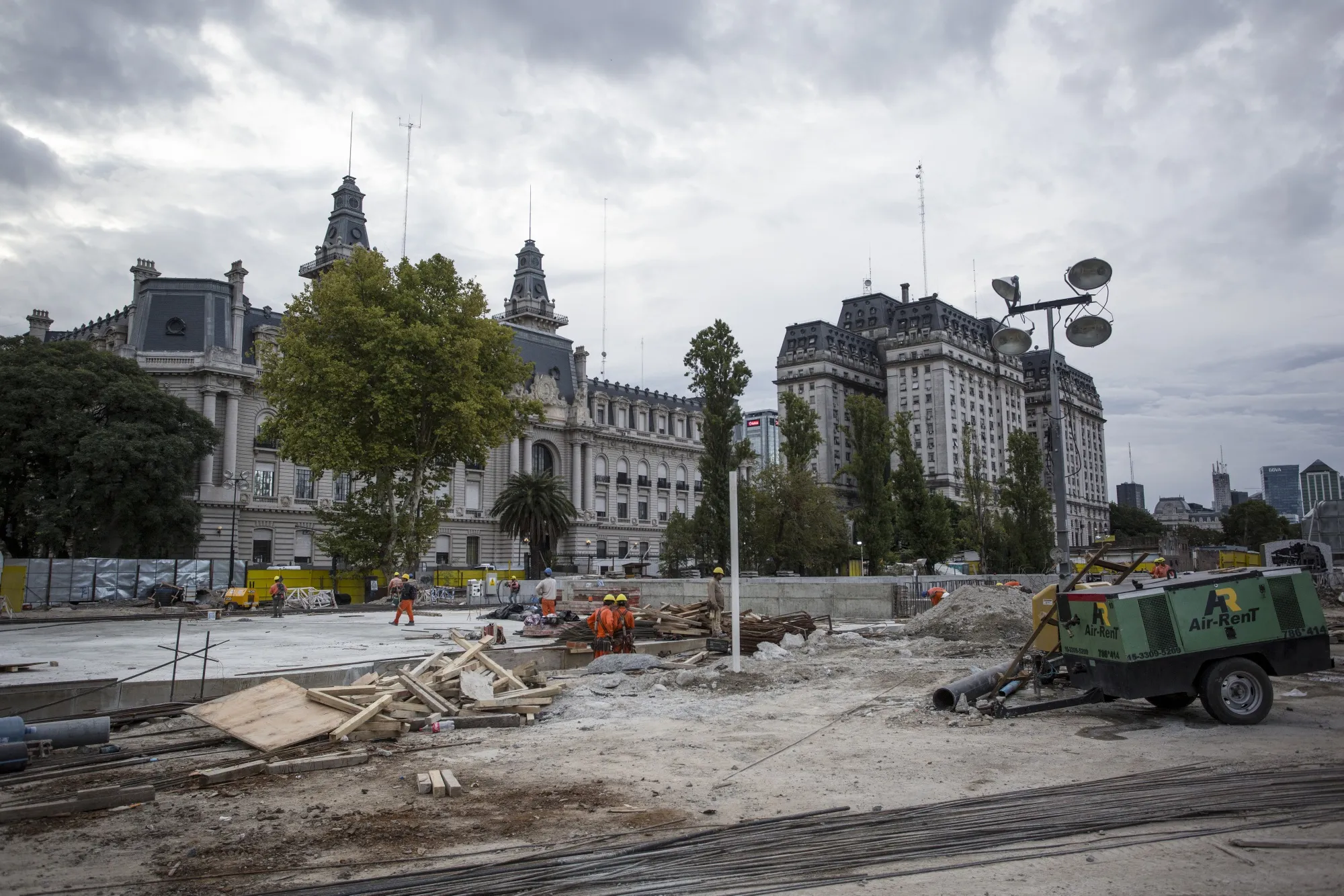 Contractors work on a street under construction in the Puerto Madero neighborhood of Buenos Aires, Argentina.