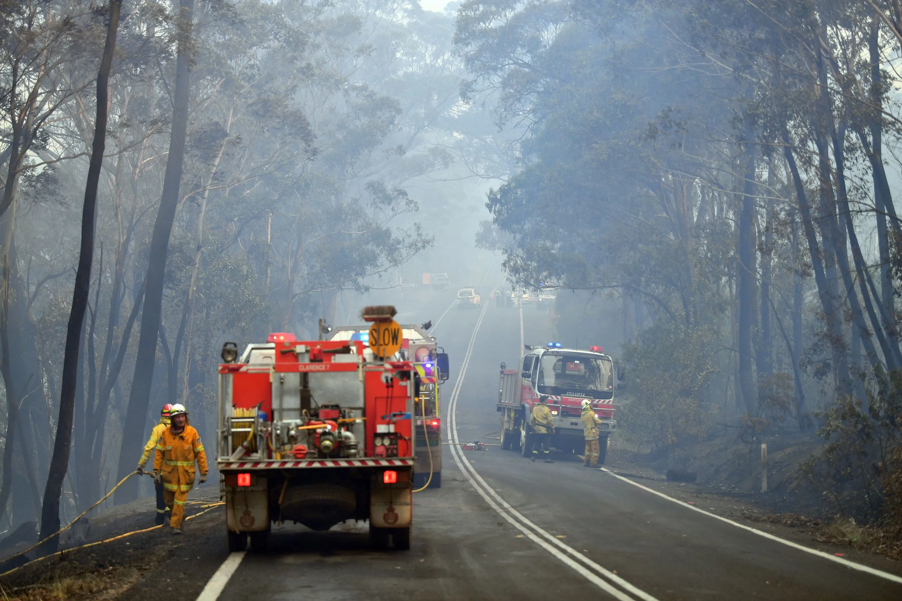 Firefighters work to extinguish a bushfire in Dargan near Sydney, on Dec. 18. Firefighters are bracing for more difficult conditions later in the week. &nbsp;