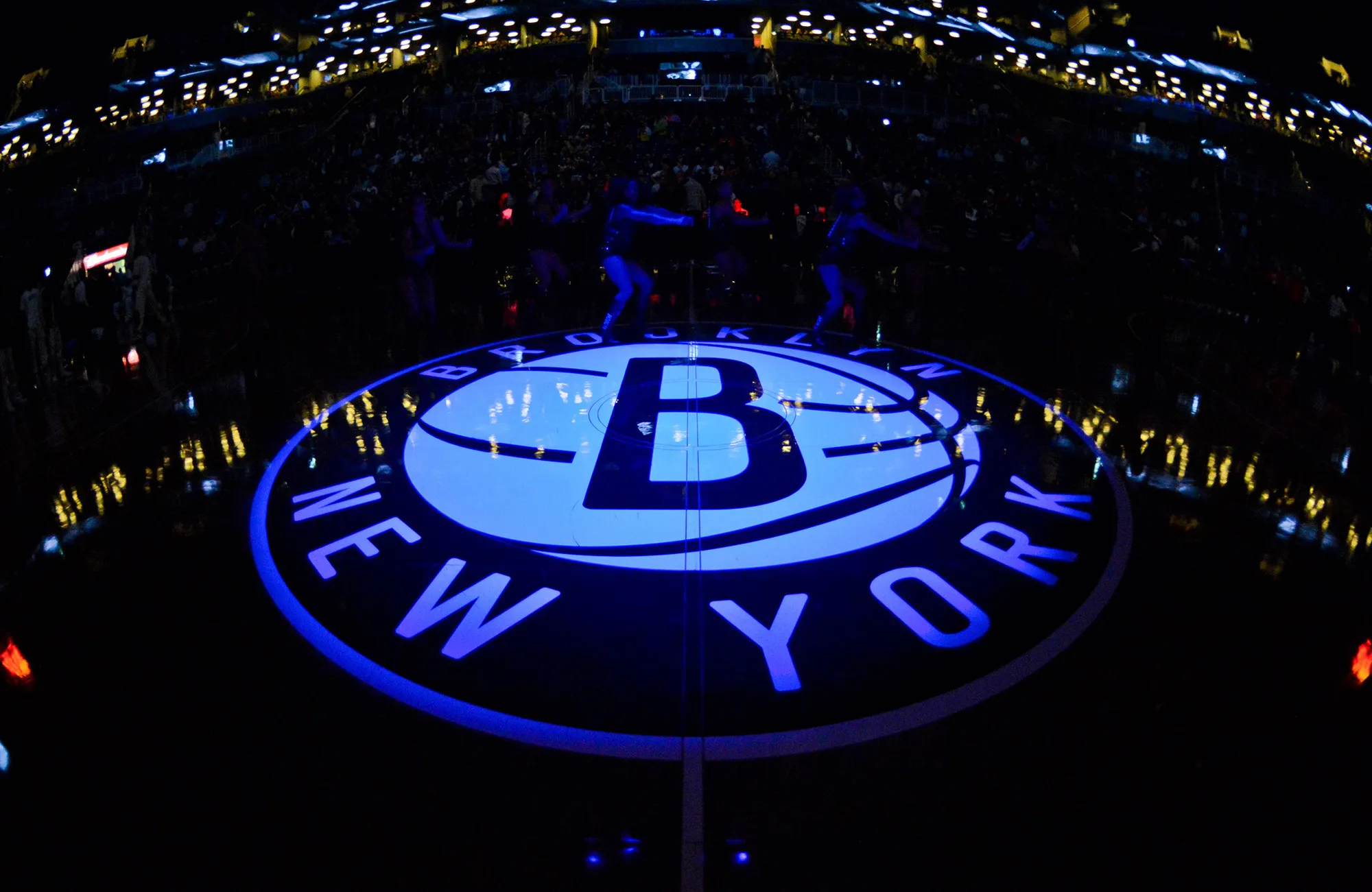 The Brooklyn Nets logo is shown at half-court before a game at Barclays Center