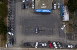 A nearly empty lot at a Ford dealership in Colma, California, on June 30.
