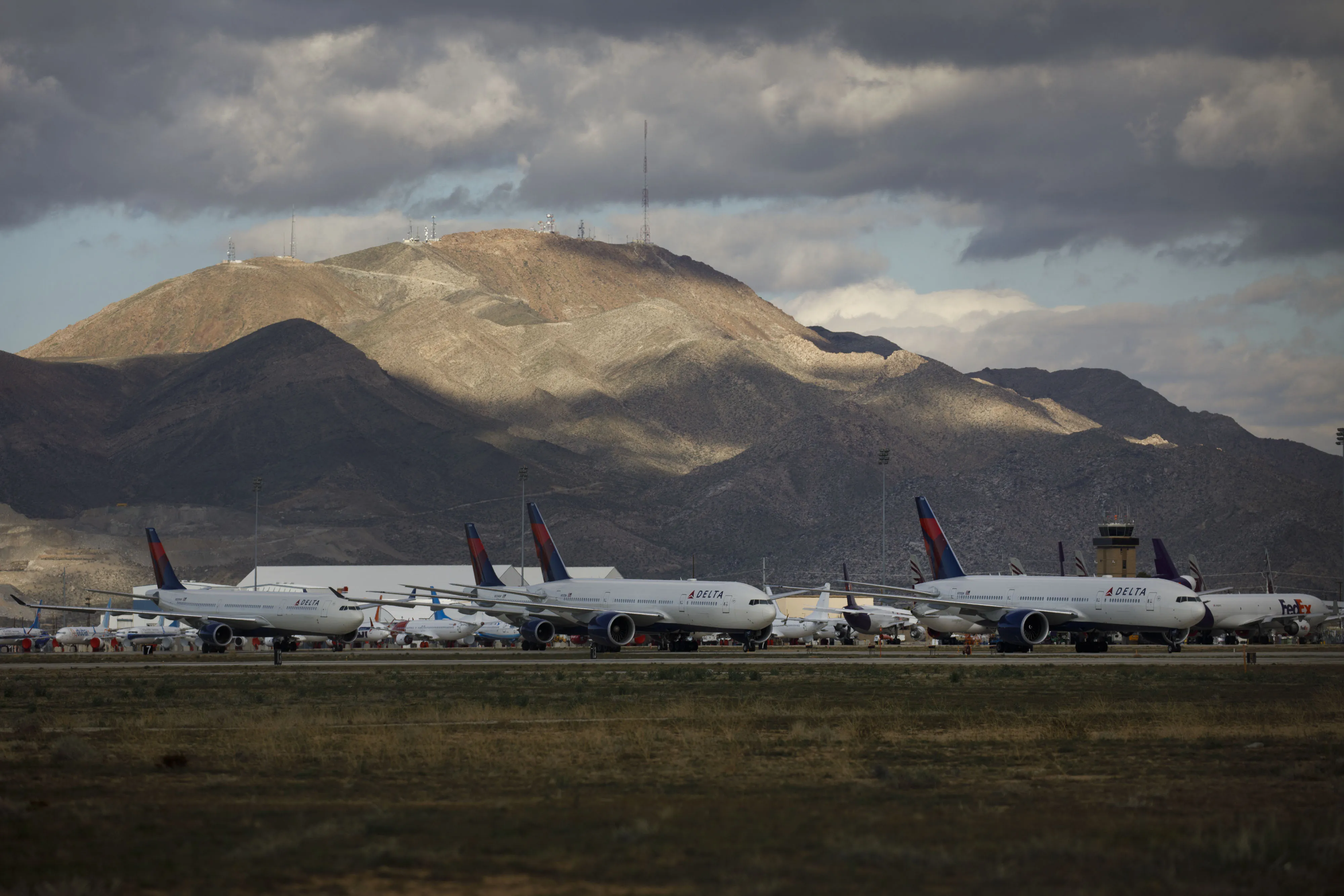 Delta Air Lines Inc. aircraft sit parked at a field in Victorville, California,&nbsp;on March 23.
