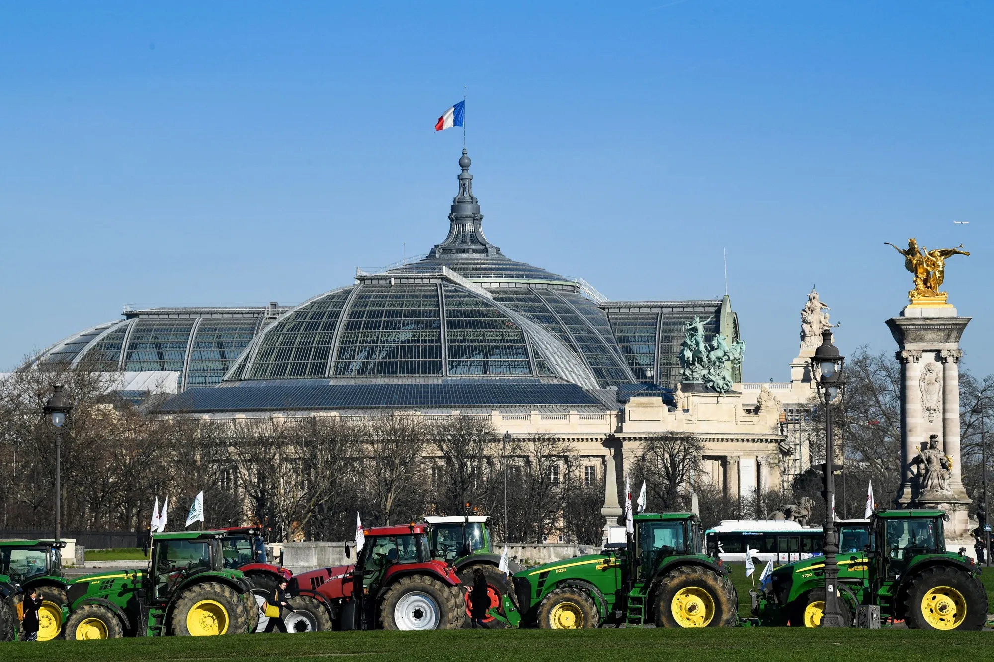 Tractors during a protest against a European ban on controversial pesticides at the Esplanades des Invalides, in Paris, France, on Feb. 8.&nbsp;