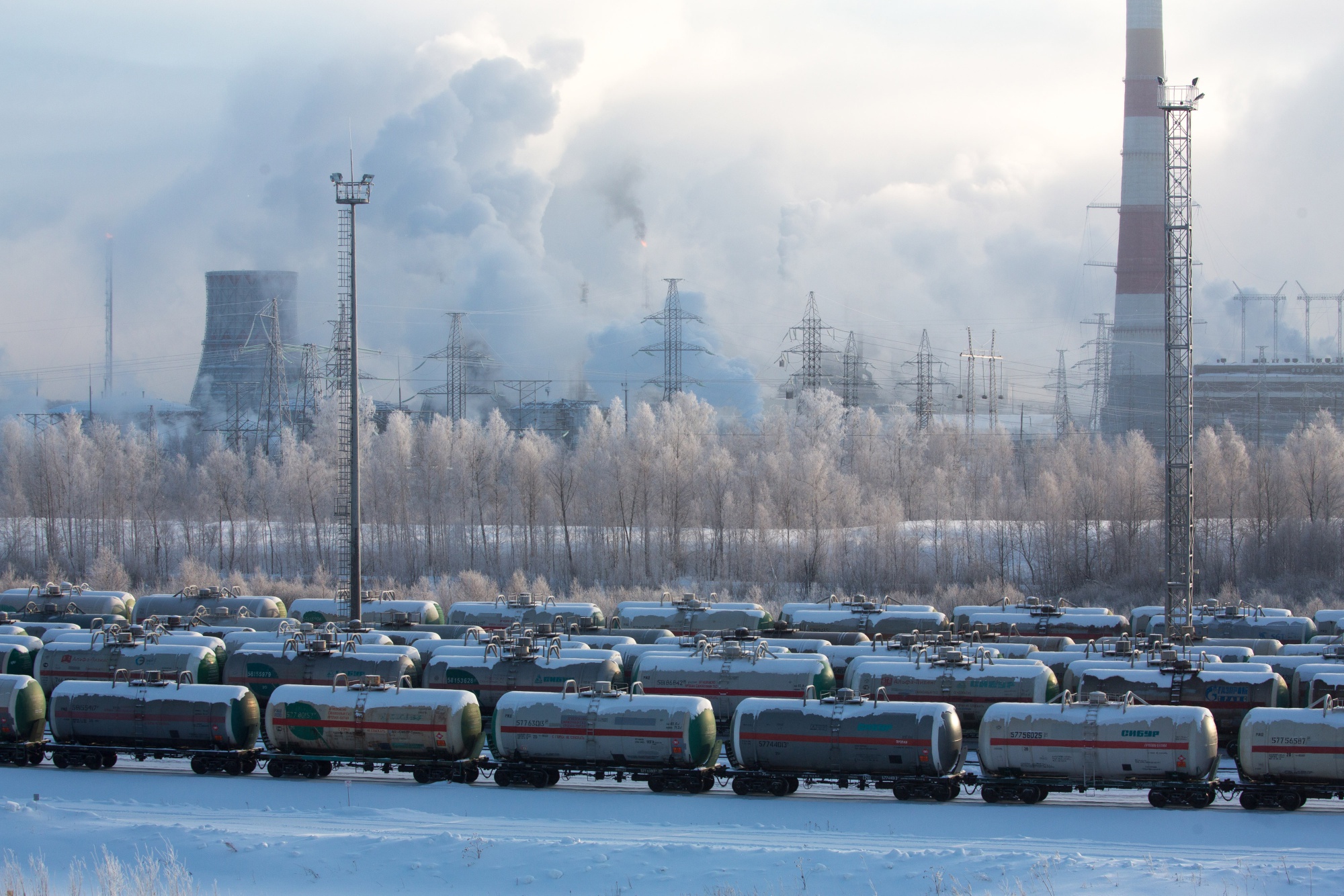 Railway wagons carrying liquefied petroleum gas (LPG) and stable natural gasoline stand at sidings near the new ZapSibNeftekhim plant, operated by Sibur Holding PJSC, in Tobolsk, Russia, on Thursday, Jan. 24, 2019. ZapSibNeftekhim is set to become the largest modern petrochemical facility in Russia.