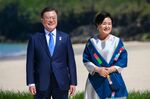 Moon Jae-in, South Korea's president, left, and Kim Jung-sook, his wife, on day two of the Group of Seven leaders summit in Carbis Bay, U.K., on Saturday, June 12, 2021. U.K.