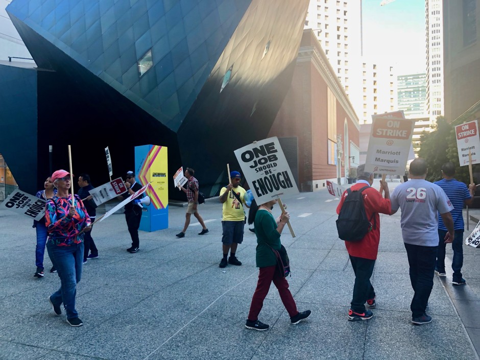Hotel employees and allies march outside the Marriot Marquis in San Francisco on October 8.