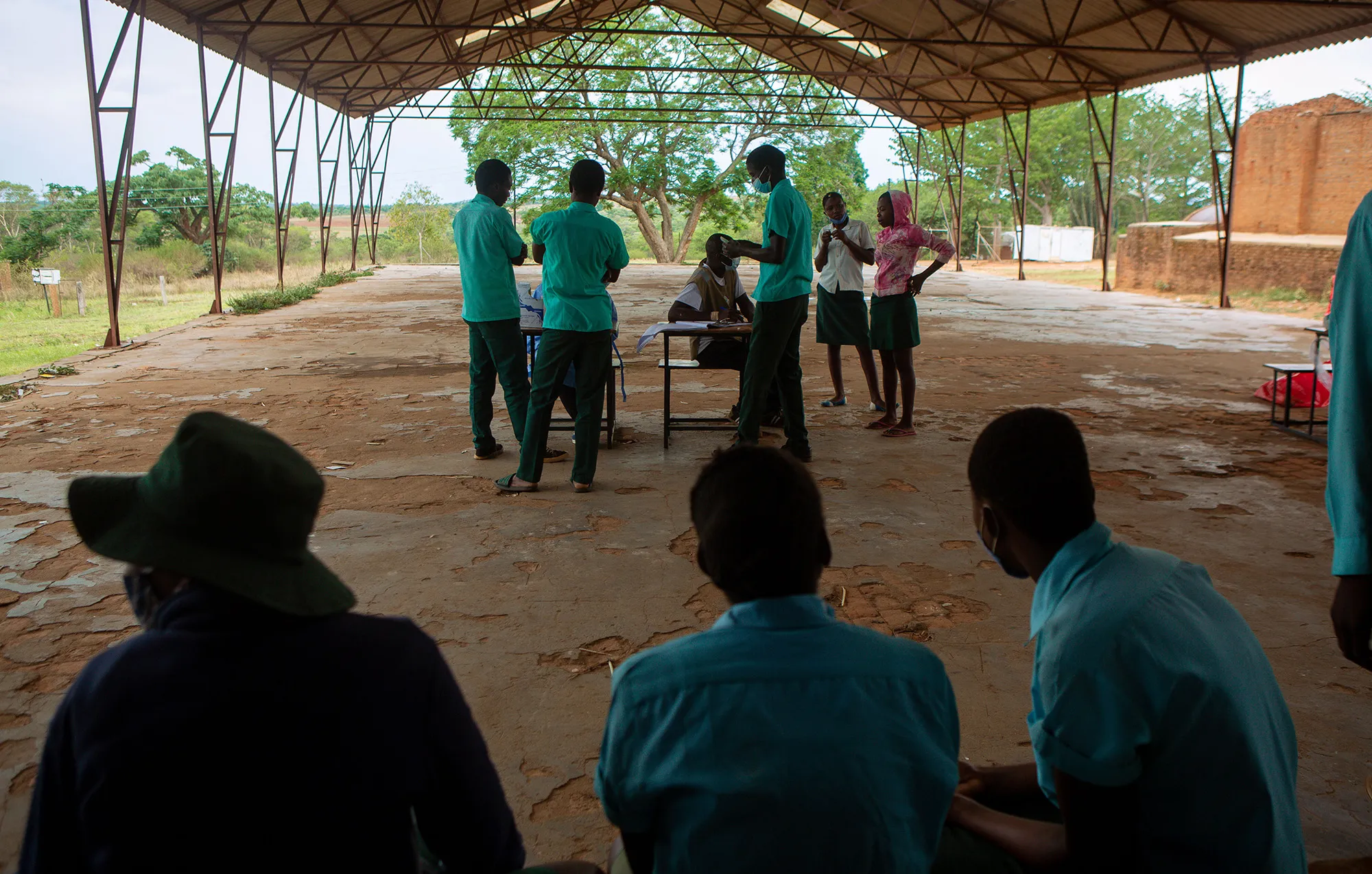 School pupils register their names before getting a&nbsp;Covid-19 vaccine in Chinhoyi, Zimbabwe.&nbsp;