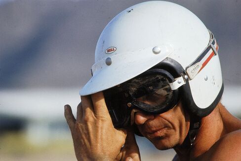 This is a closeup of Steve McQueen riding in the Mojave Desert in 1971. If McQueen wore a helmet, so should you. (And get the rest of the gear, too!)