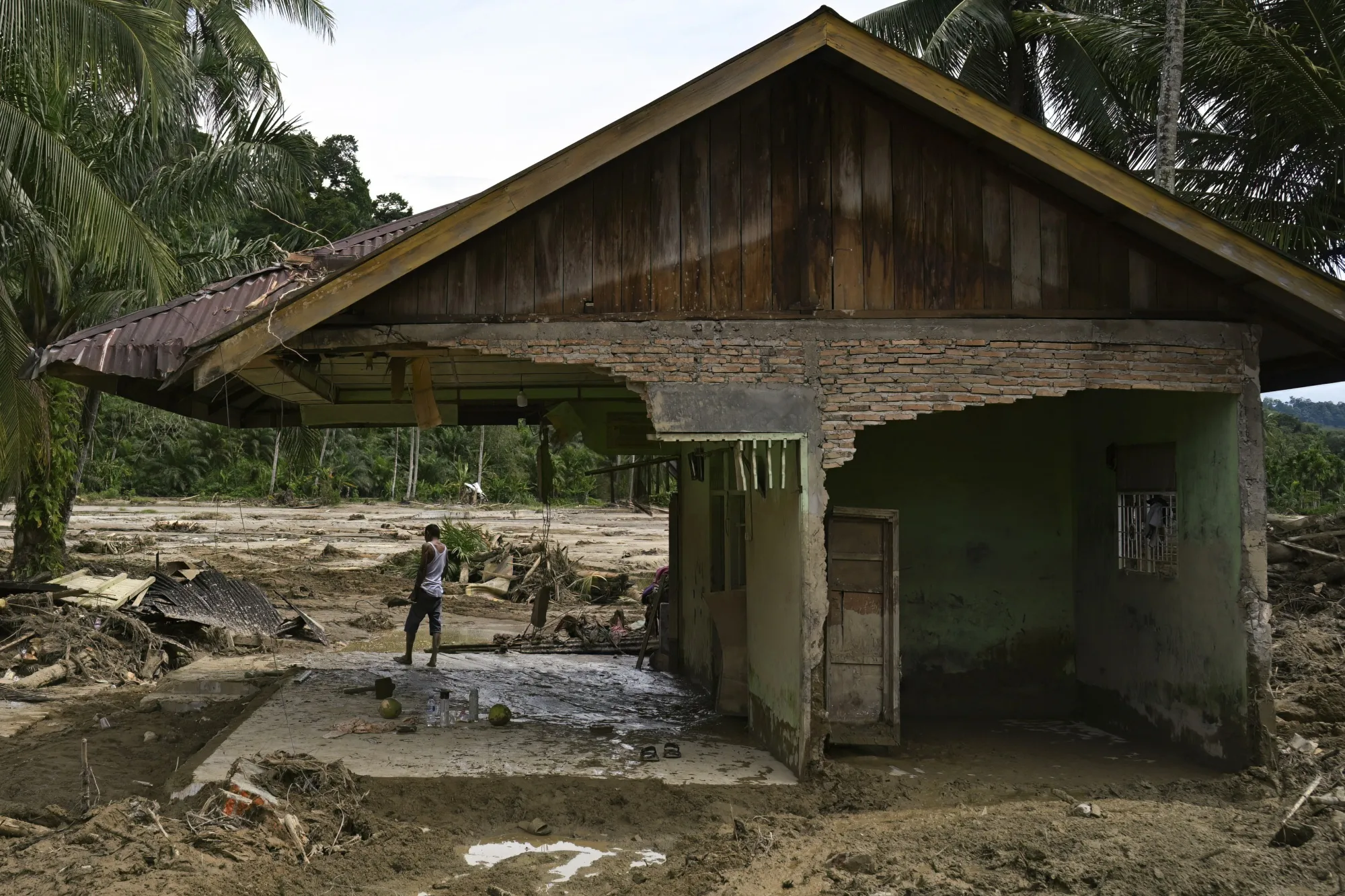 A damaged house after a flash flood in Garoga, North Sumatra province on Dec. 4, 2025. Photographer: YT Hariono&nbsp;/AFP/Getty Images