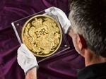 The Queen's Platinum Jubilee 15 kilogram coin made with fine gold, the largest ever coin made by the Royal Mint.