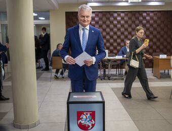relates to Lithuanians return to the polls with incumbent president favored to win 2nd election round