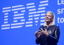 Ginni Rometty, then CEO of IBM, delivering a speech in 2019 in a sleek motorcycle jacket.