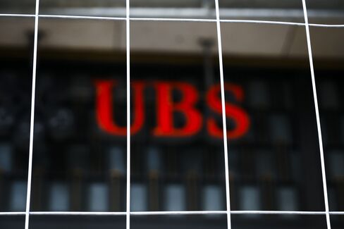 UBS Posts Quarterly Loss on Libor Fine, Reorganization Cost