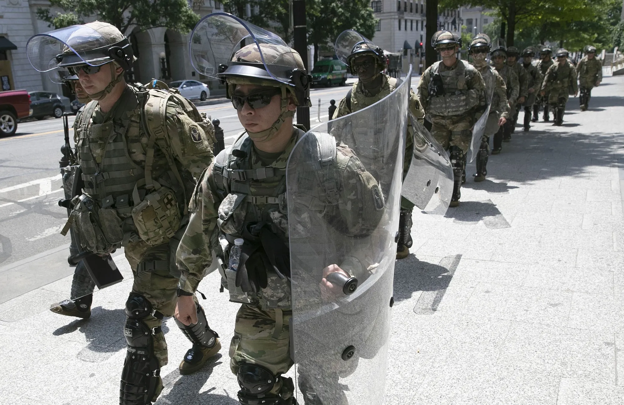 Members of an airborne military unit march outside the U.S. Treasury Building&nbsp;in Washington, DC. on June 4.