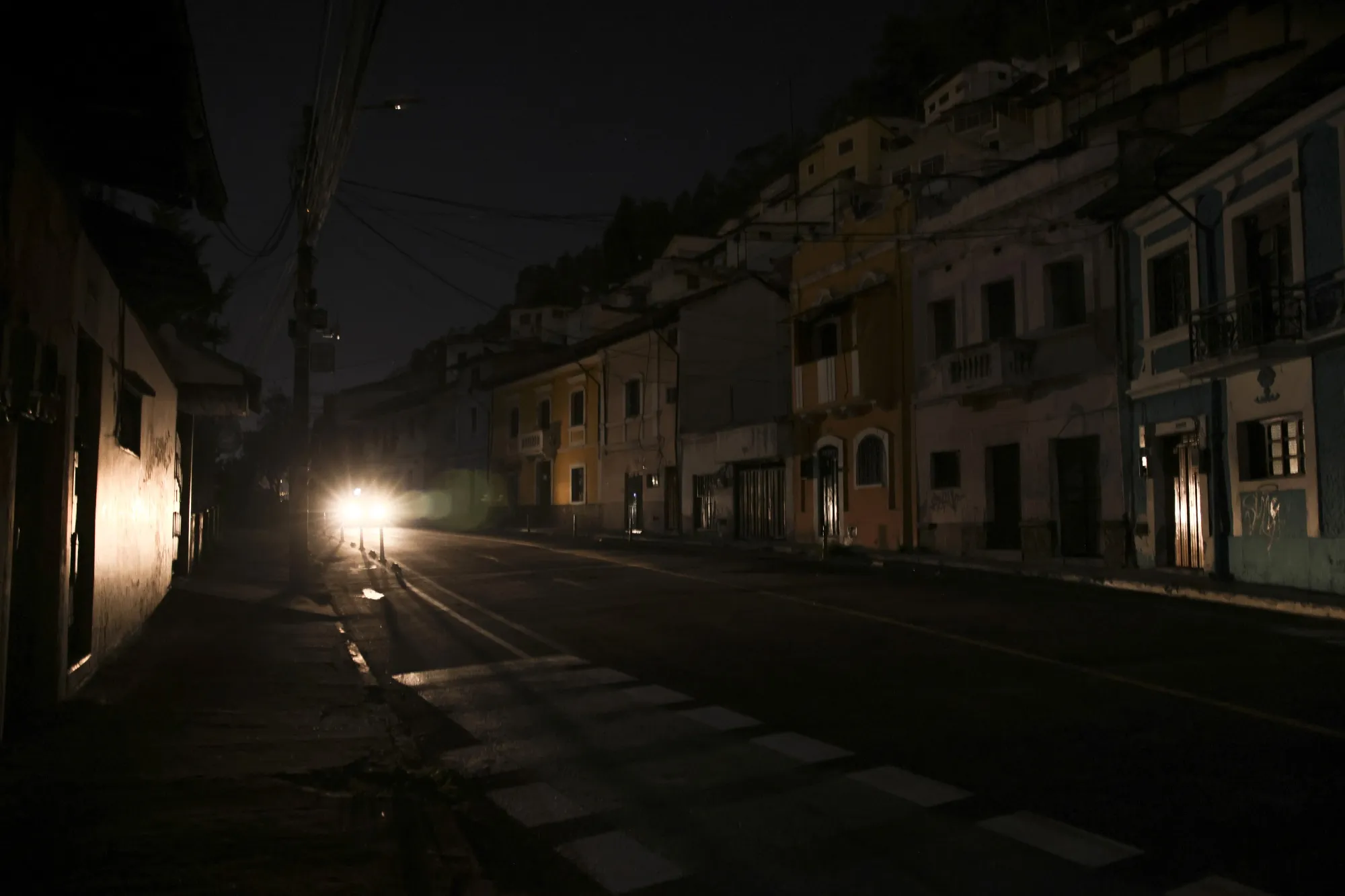 Residential buildings during a planned blackout in Quito on Sept. 18.