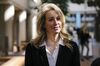 Elizabeth Holmes leaves federal court in San Jose, California, in 2019.
