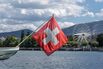 A Swiss national flag on a boat on Lake Geneva.