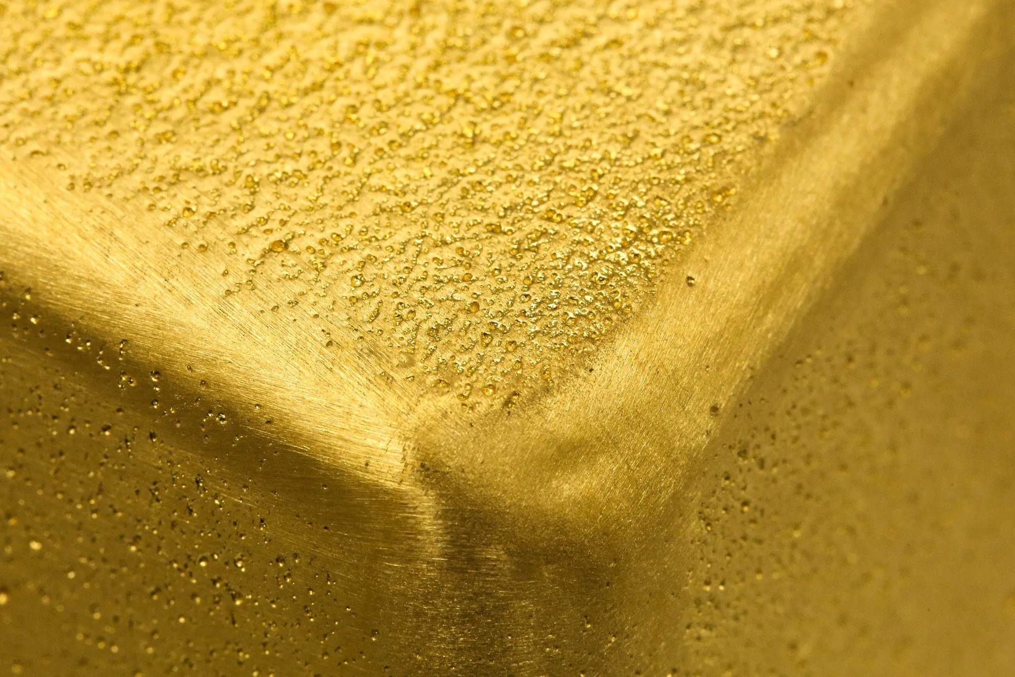 A 12.5 kilogram gold ingot sits at the Uralelectromed Copper Refinery, operated by Ural Mining and Metallurgical Co. (UMMC), in Verkhnyaya Pyshma, Russia, on Thursday, July 30, 2020. Gold surged to a fresh record Friday fueled by a weaker dollar and low interest rates. Silver headed for its best month since 1979.