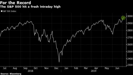 U.S. Stocks Rise to Records, Treasuries Rally: Markets Wrap