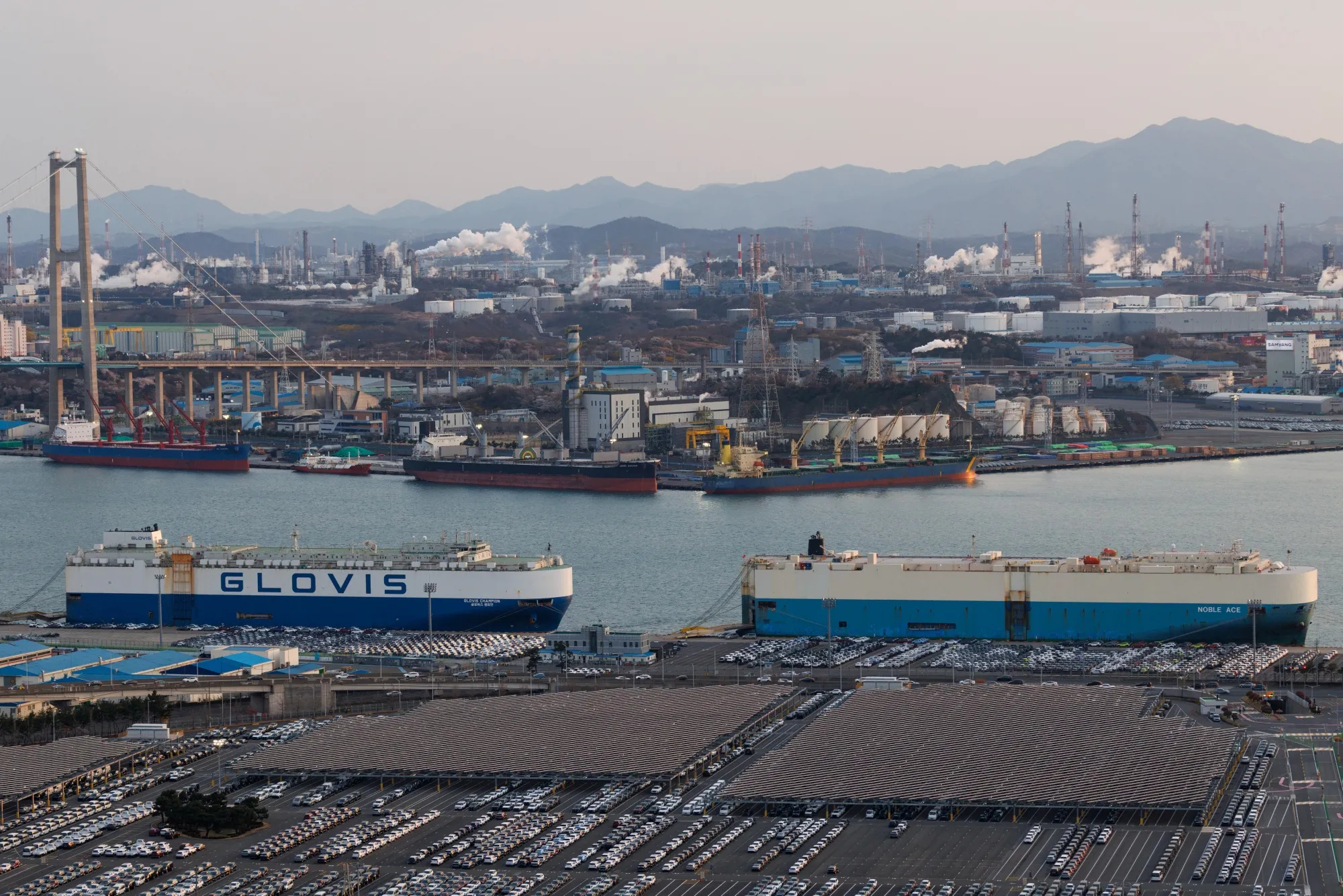 Vehicle carrier cargo ships docked near the Hyundai Motor Co. Ulsan plant in Ulsan, South Korea.