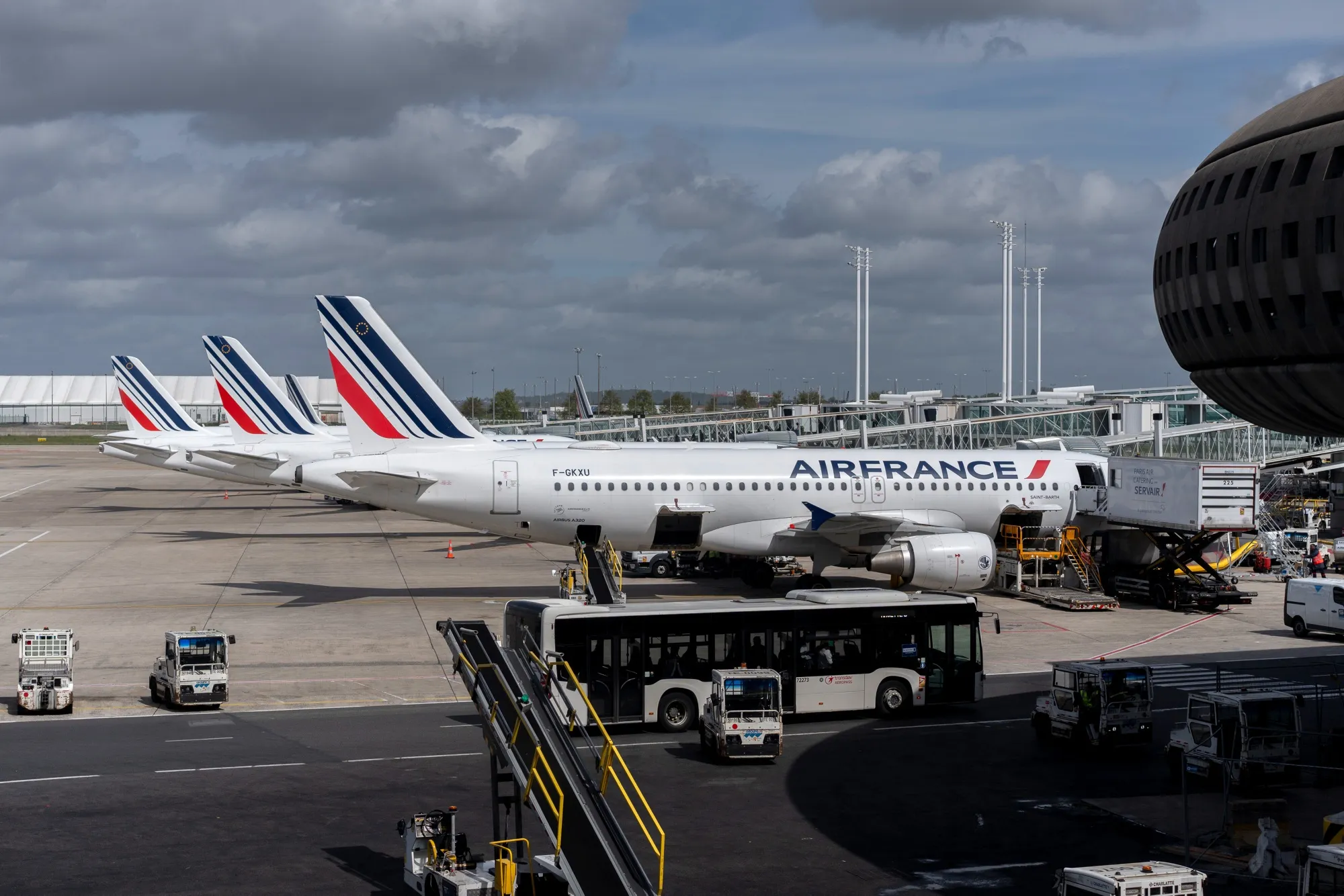 Air France passenger jets at Paris Charles de Gaulle Airport.