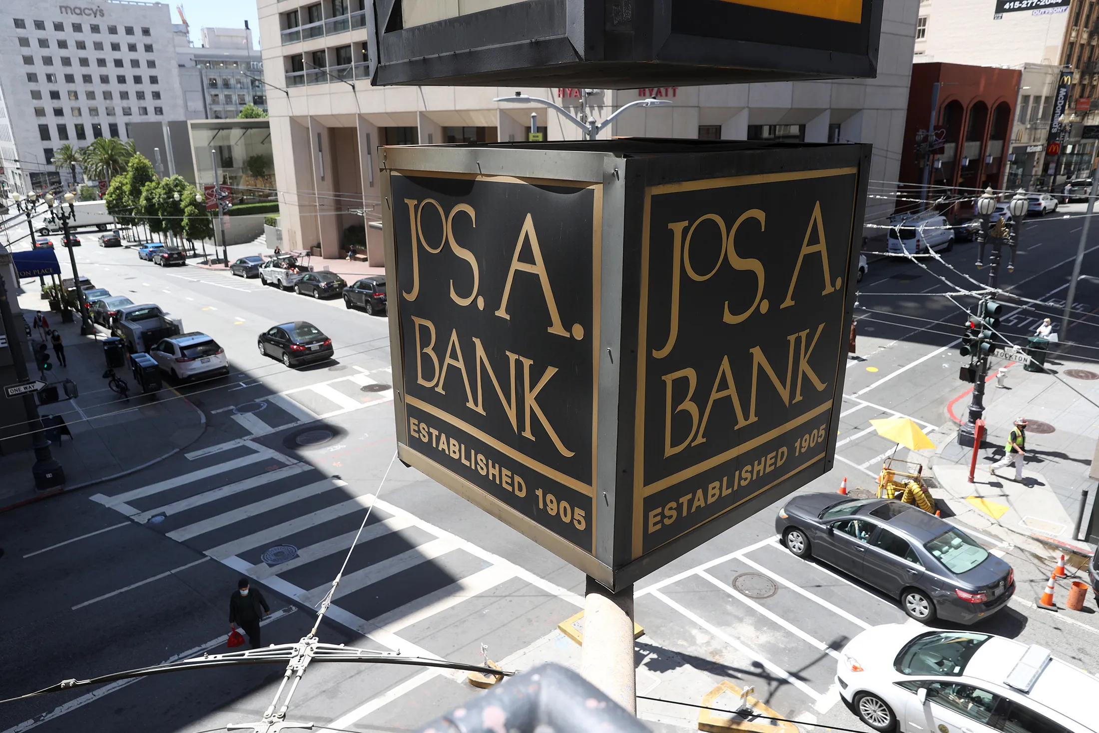 A Jos A. Bank clothing store sign.