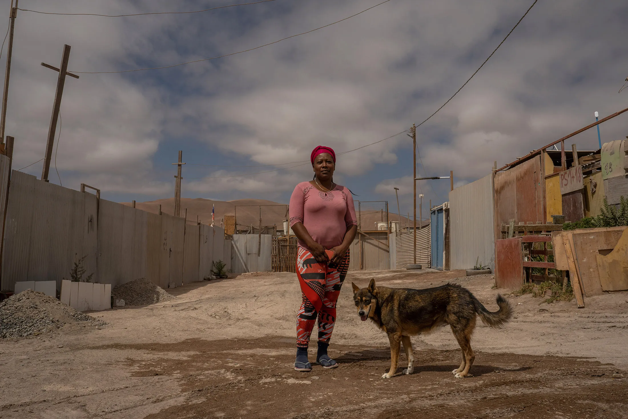 Angela Popó, 49, is a Colombian migrant and community leader in the Flor de Población encampment in Alto Hospicio, Tarapacá, Chile.
