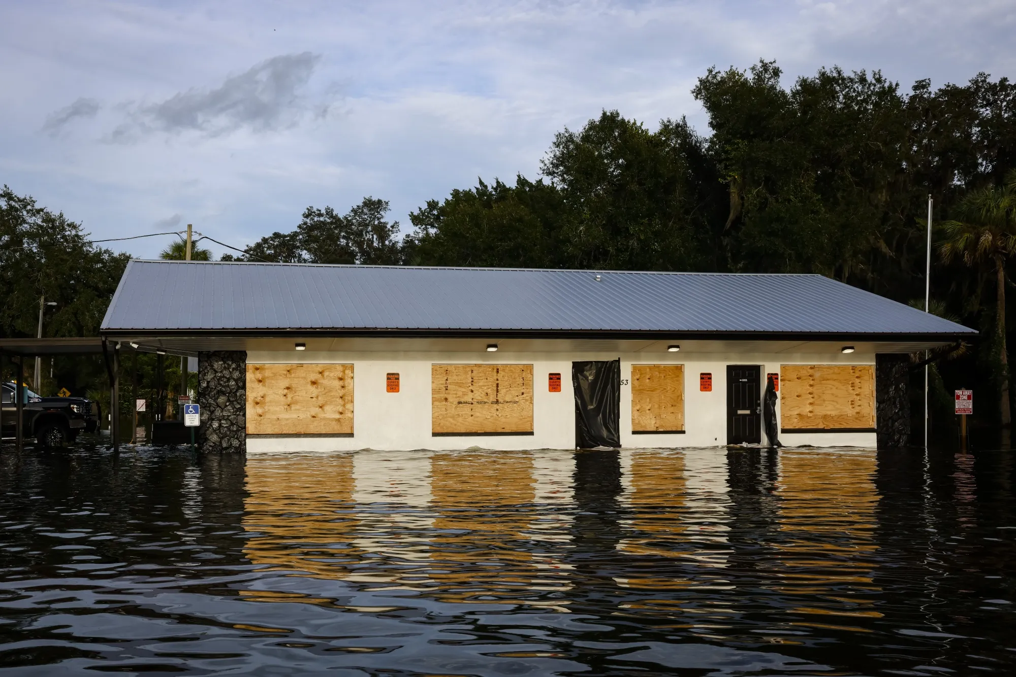 A retail store partially submerged in floodwaters after Hurricane Idalia made landfall in Cristal River, Florida.