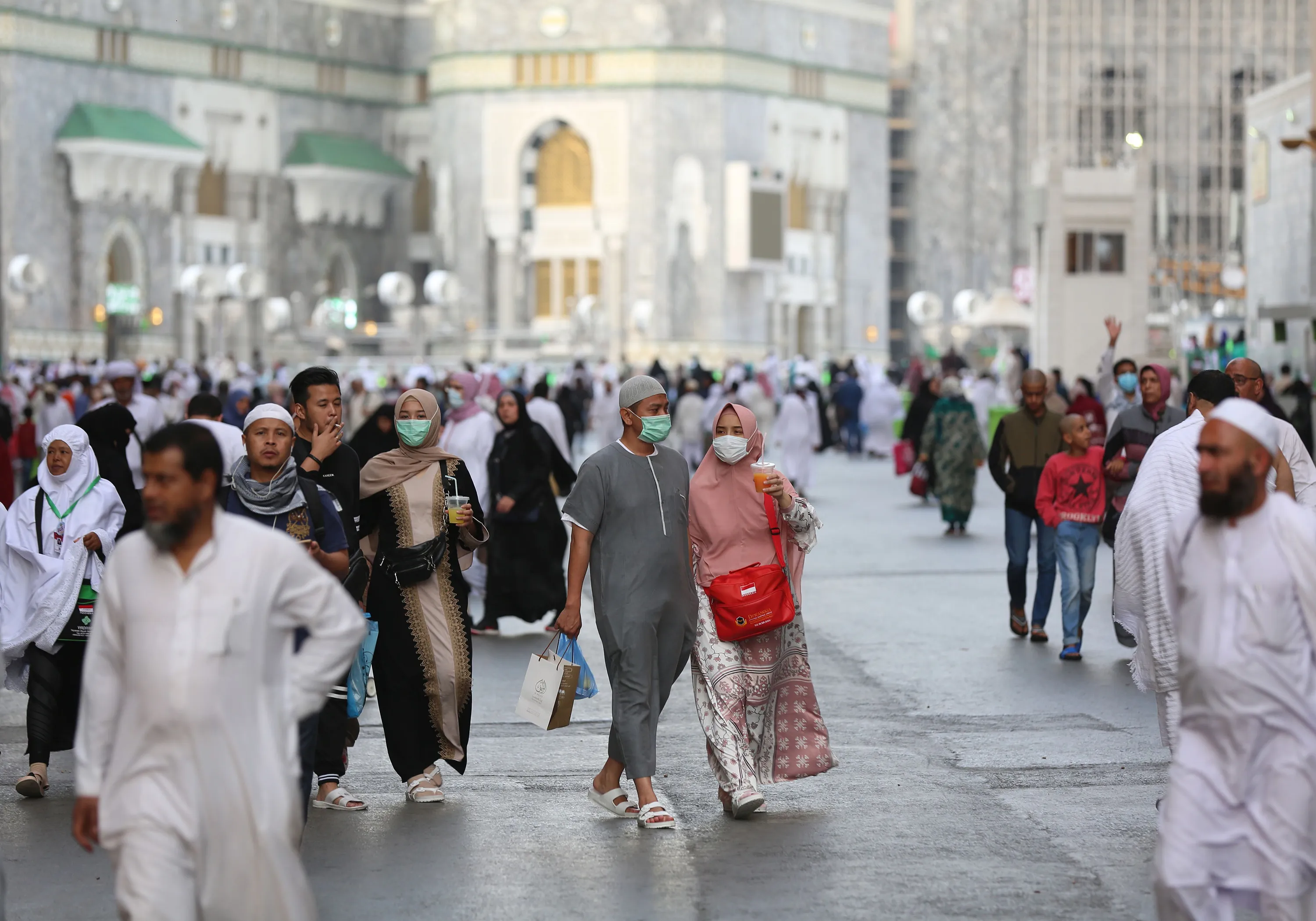 Muslim pilgrims wear masks at the Grand Mosque in Saudi Arabia's holy city of Mecca.