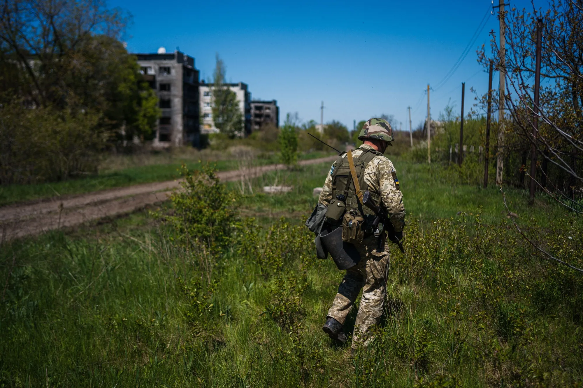 A Ukrainian serviceman patrols in Chasiv Yar near the frontline city of Bakhmut, Donetsk region on May 3.