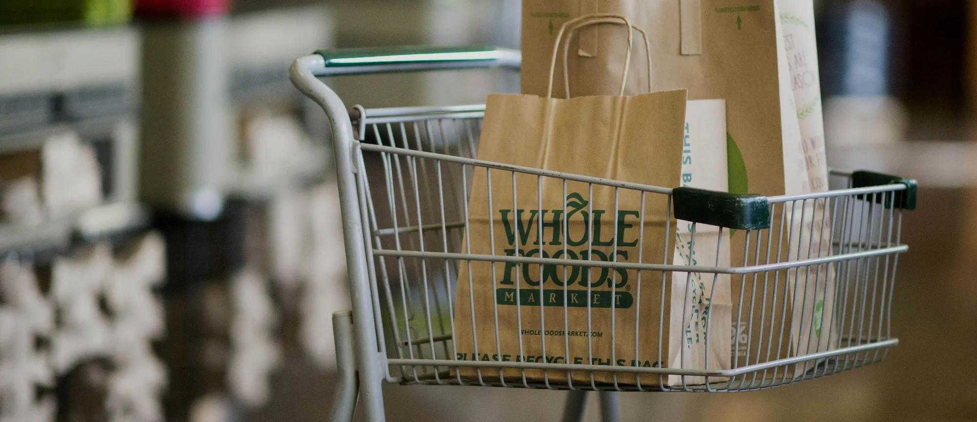 A cart full of grocery bags sits in the isle at Whole Foods in Dublin, Ohio on Friday, November 7, 2014.
