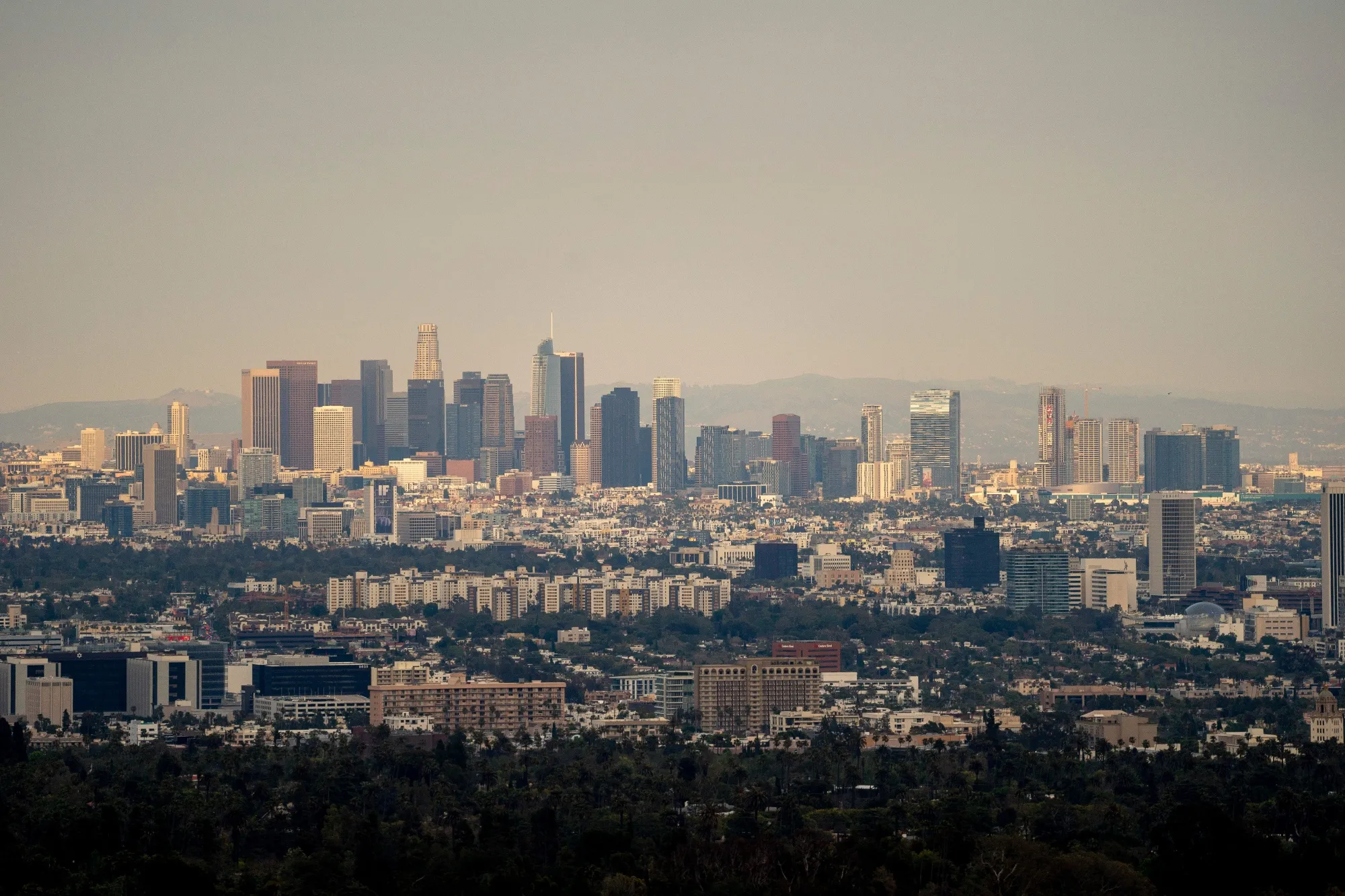 The downtown skyline in Los Angeles, California, US, on Friday, May 17, 2024. Even as many cities have returned to post-pandemic normalcy and employers have enacted stricter in-person work policies, office-rent growth in the central business districts of cities such as LA have lagged behind outlier areas, according to brokerage Savills.