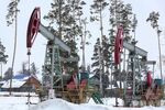 Oil pumping jacks, also known as nodding donkeys, operate in snow at an oilfield operated by Bashneft PAO in the village of Dyurtyuli, Russia, on Thursday, March 3, 2016. Bashneft is an upstream and down stream oil &amp; gas provider which explores, produces and refines its own oil and gas which it extracts from brownfield reserves in the Russian Federation.
