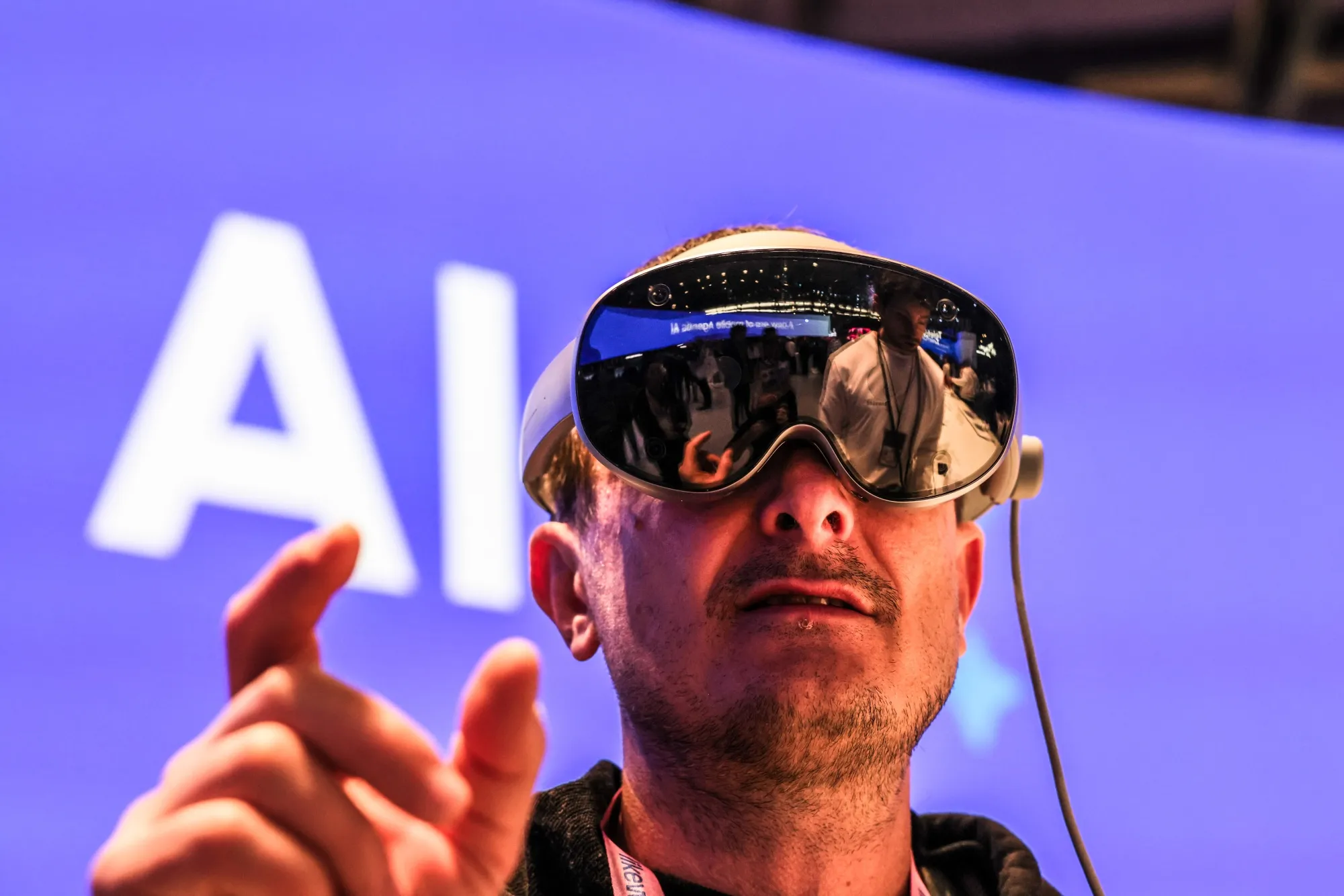A person using a Samsung Galaxy Virtual Reality headset at the MWC Barcelona 2026 in Barcelona.
