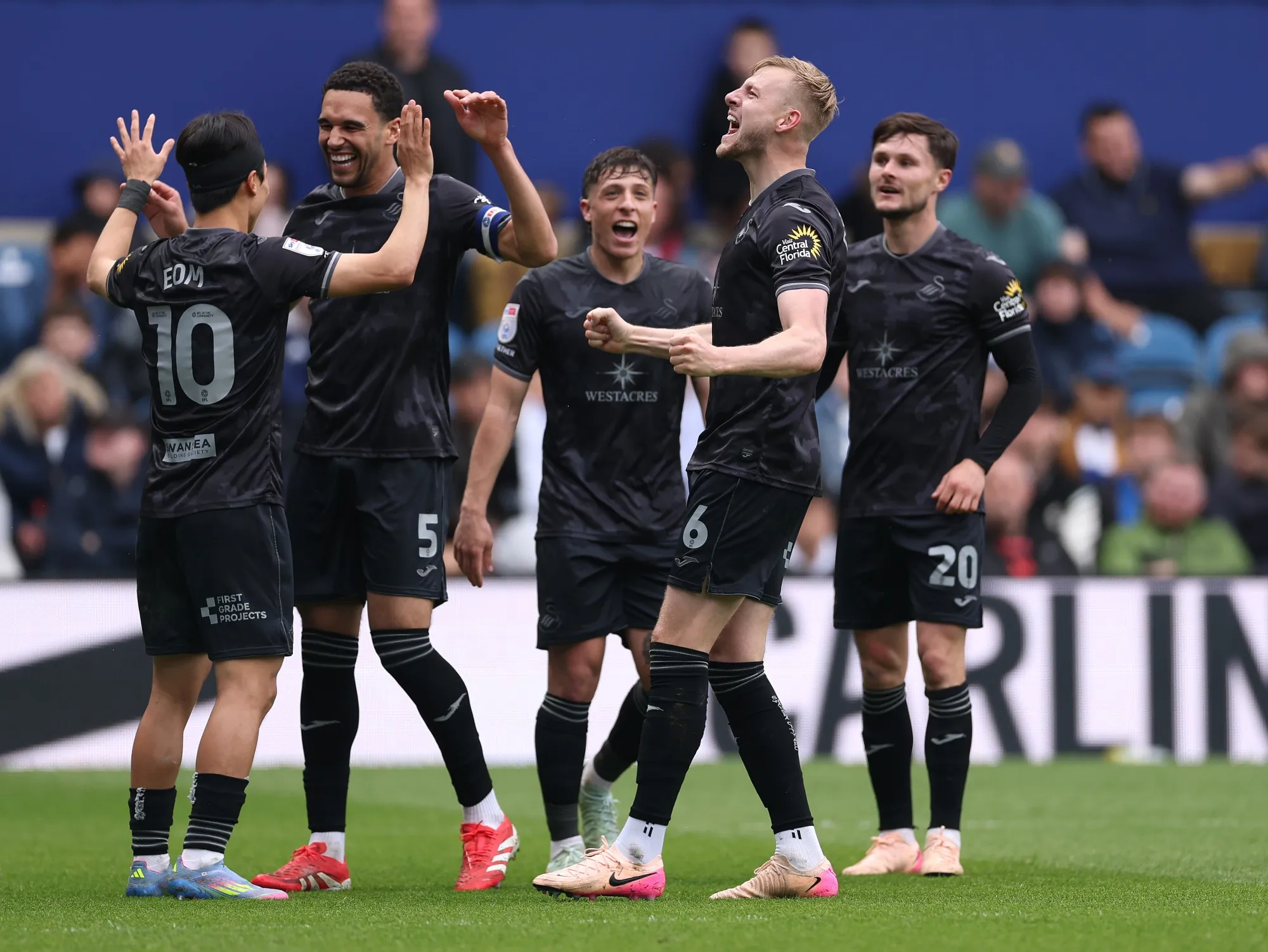Harry Darling of Swansea City celebrates scoring a goal during a match against Queens Park Rangers FC&nbsp;in London, on April 21.
