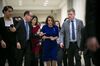 House Speaker Nancy Pelosi, center, is seen on Capitol Hill in Washington, on Feb. 7.