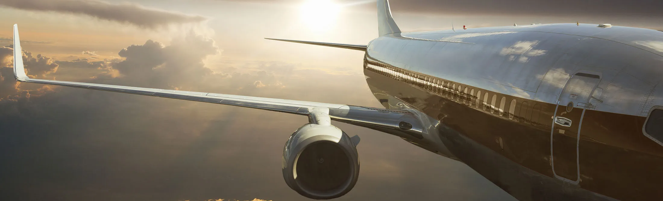 Commercial jet flying over clouds