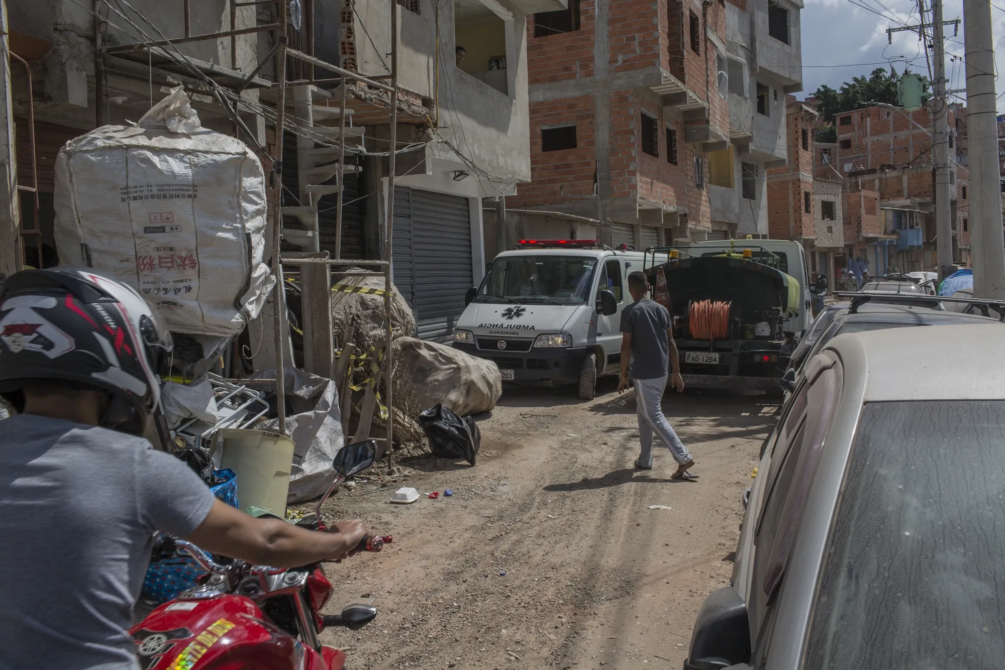An ambulance transports medical workers while responding to an emergency scene in the Paraisópolis favela of Sao Paulo, Brazil, on&nbsp;April 15.&nbsp;