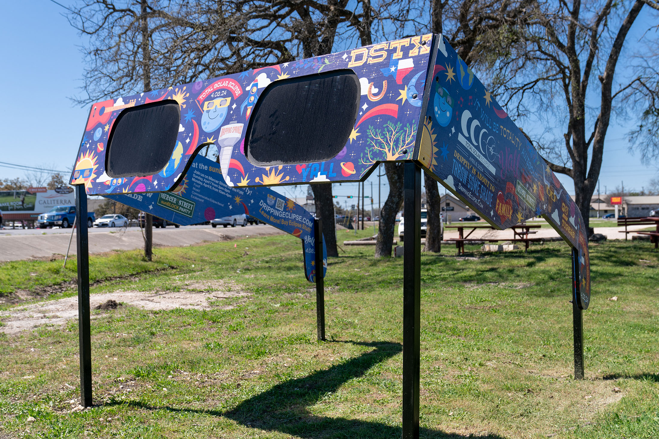 The City of Dripping Springs, Texas is preparing for the solar eclipse with a set of larger than life glasses on display at Veterans Memorial Park.