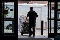 An employee moves orders to a delivery truck at an appliance store in Sacramento, California, US. 