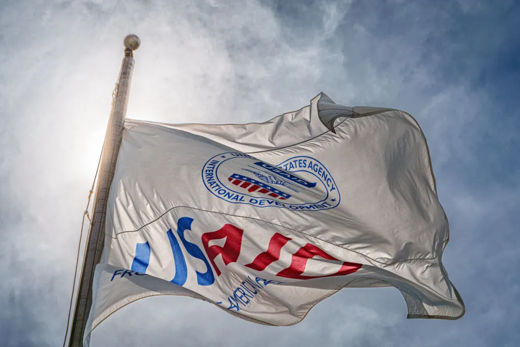 The US&nbsp;Agency of International Development&nbsp;flag flies in front of the agency’s headquarters building in Washington, DC.