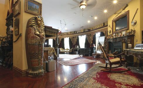 The castle has 12 fireplaces, elevators, central air, and a backup generator—plus a lot of antiques to be negotiated.