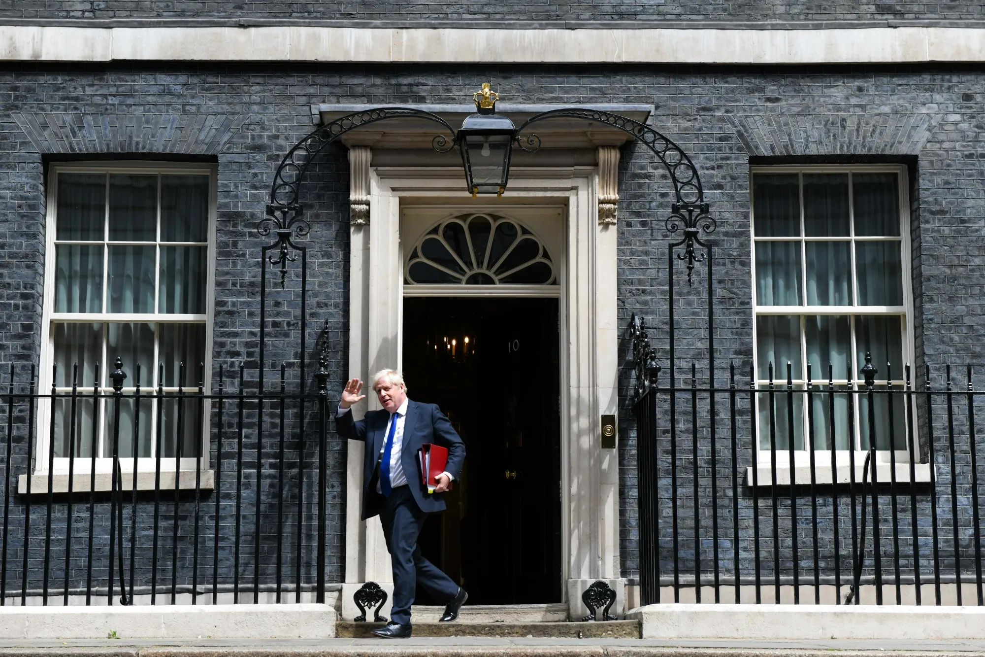 Boris Johnson departs 10 Downing Street ahead of PMQs, on July 6.