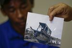 A photo of the damaged Filipino fishing vessel F/B Gimver 1 is shown during a press conference&nbsp;in Manila&nbsp;on June 17.